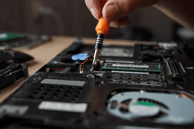 man repairs laptop by himself computer repair 563818 2531